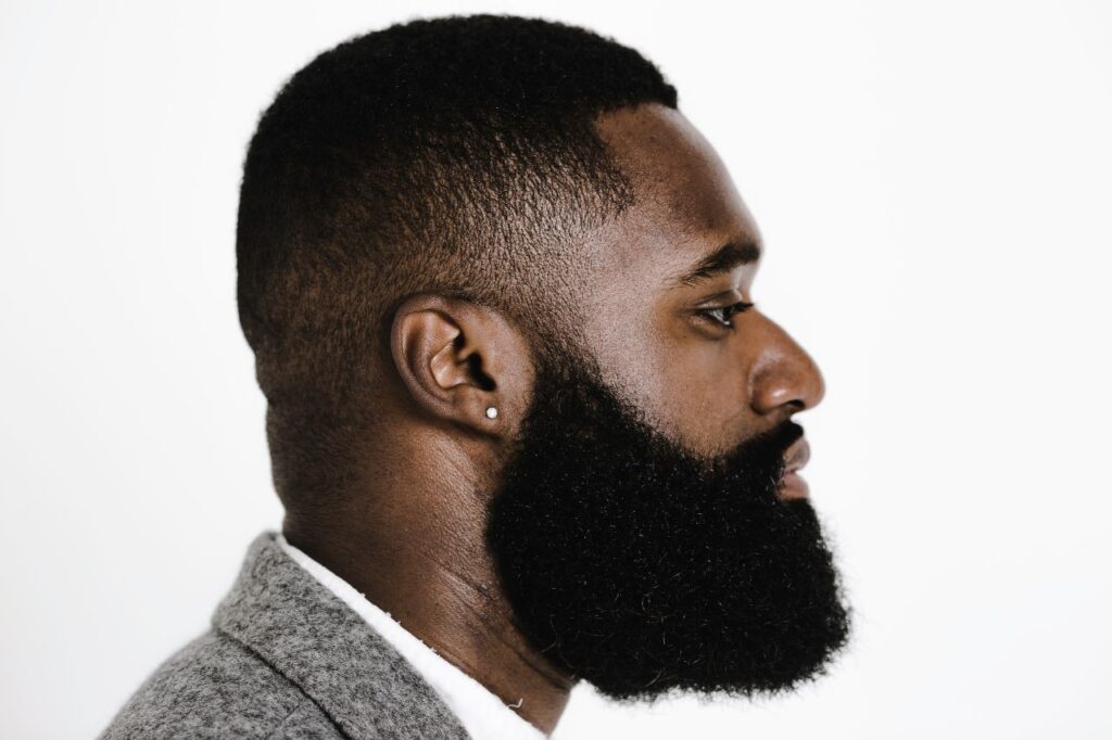 Beard Grooming Tips: Caribbean man with a well-groomed, shaped full beard